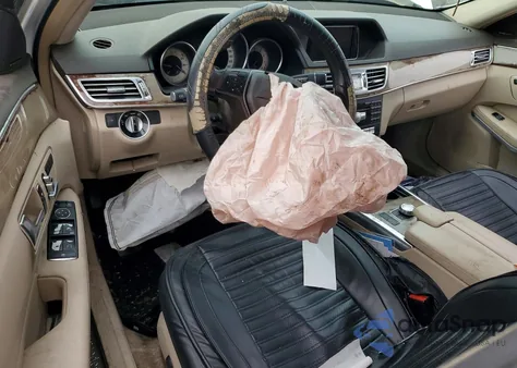 2014 Mercedes-Benz E 350 z USA, uszkodzony, nr VIN WDDHF5KB9EA806844